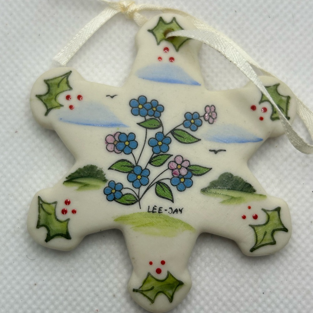 Hand painted Christmas tree ornament ceramic snowflake flowers signed North Pole
